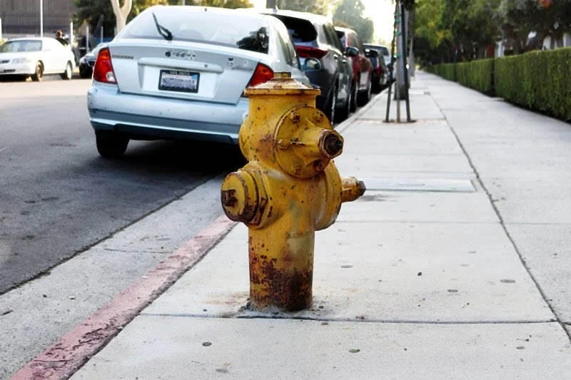 yellow dirty fire hydrant
