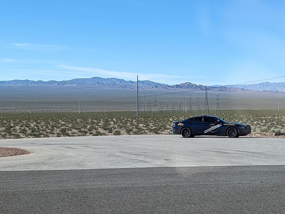 officer on side of highway