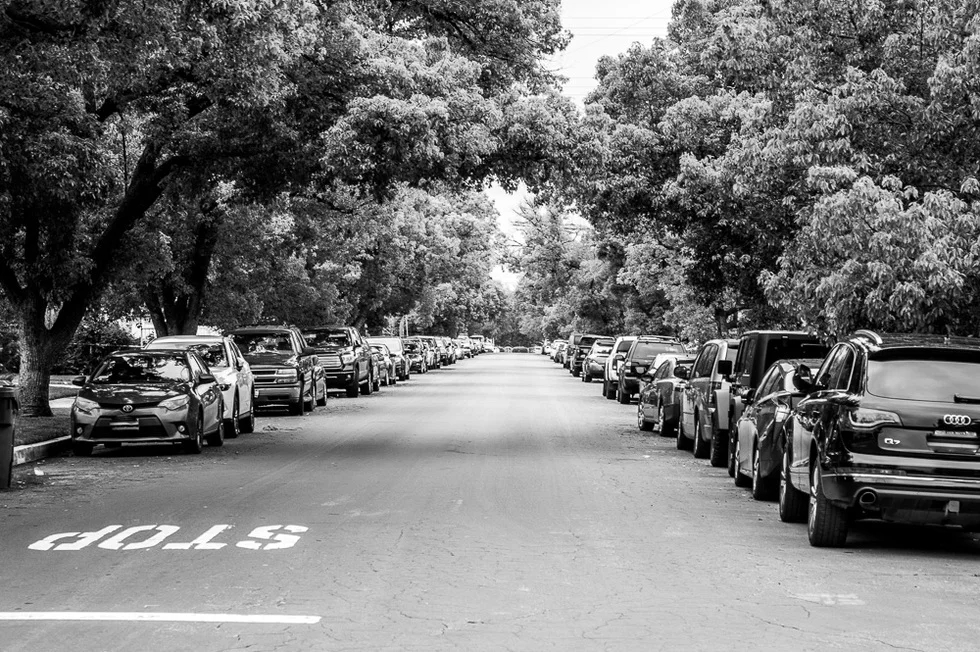 cars parked on side of road
