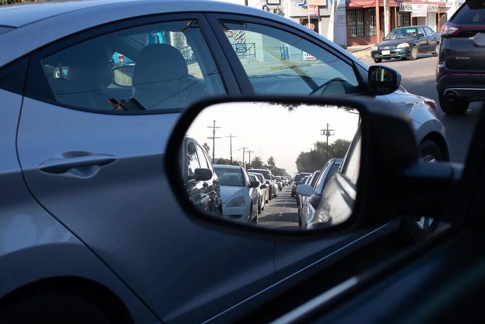 city traffic side mirror