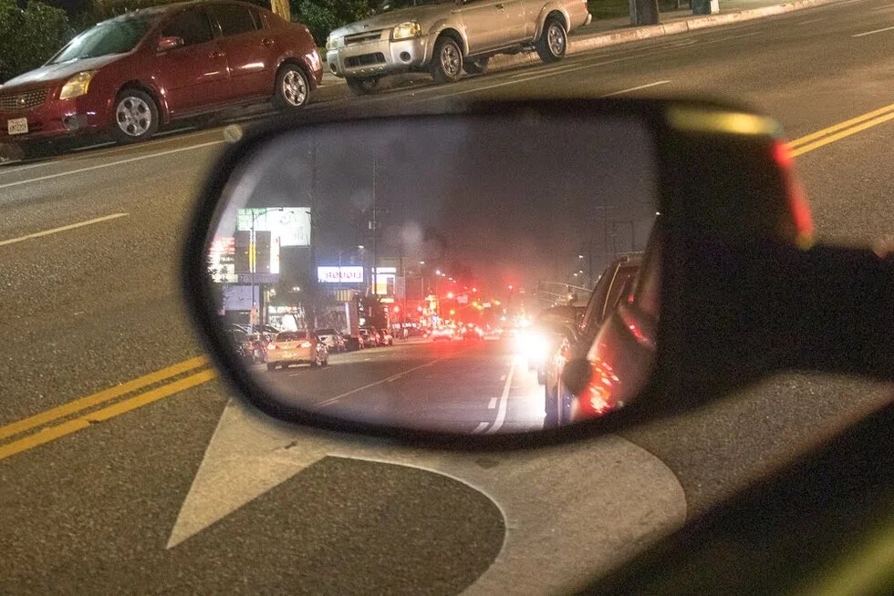 side mirror city traffic