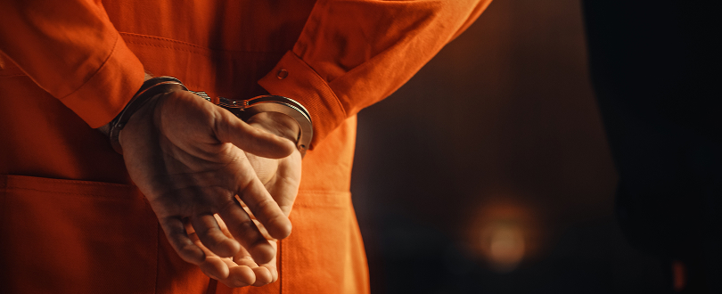 inmate in handcuffs