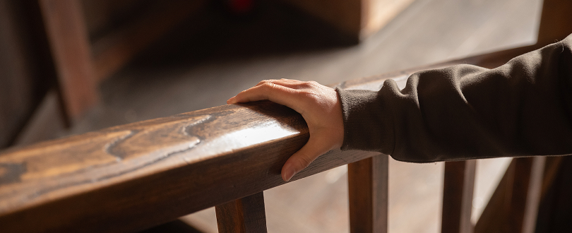holding handrail using stairs