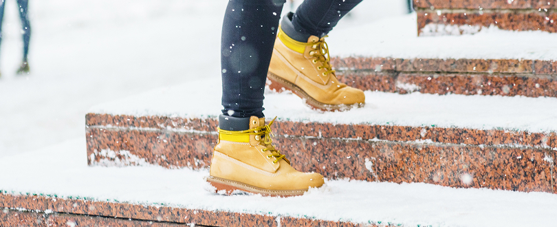 walking on snowy stairs